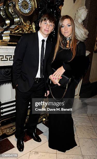 Footballer Andrey Arshavin and wife Yulia attend the official UK launch of the Gift Of Life Foundation at The Wallace Collection on January 13, 2012...