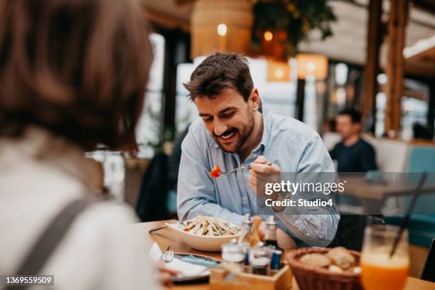 enjoyable lunch with my bae - coworker lunch stock pictures, royalty-free photos & images