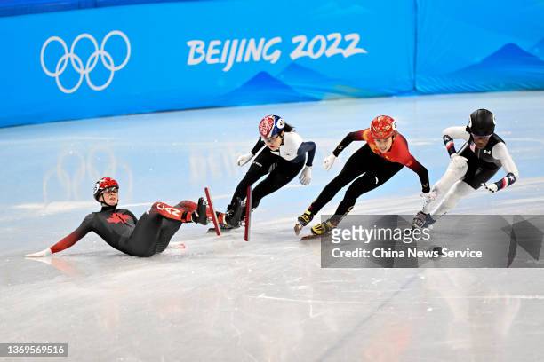 Zhang Chutong of Team China, Yubin Lee of Team South Korea and Maame Biney of Team United States compete during the Women's Short Track Speed Skating...