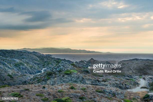 beautiful sea sunset landscape in cap de creus national park, spain - cap de creus stock pictures, royalty-free photos & images