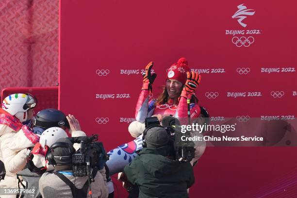 Petra Vlhova of Team Slovakia is lifted up by her teammate after winning the Women's Alpine Skiing Slalom on Day five of the Beijing 2022 Winter...