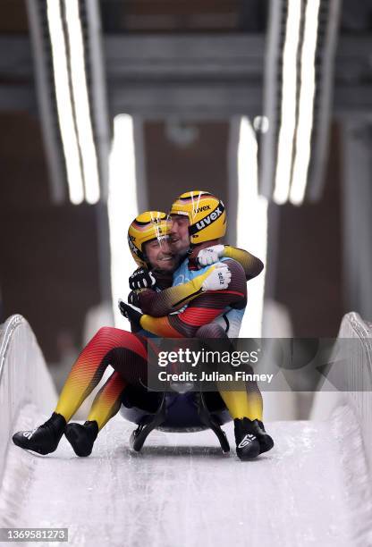 Tobias Wendl and Tobias Arlt of Team Germany react after winning gold during the Luge Doubles Run 2 on day five of the Beijing 2022 Winter Olympic...