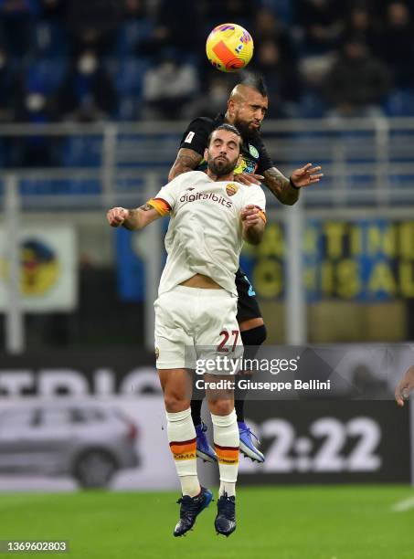 Arturo Erasmo Vidal Pardo of FC Internazionale and Sergio Miguel Relvas de Oliveira of AS Roma in action during the Coppa Italia match between FC...