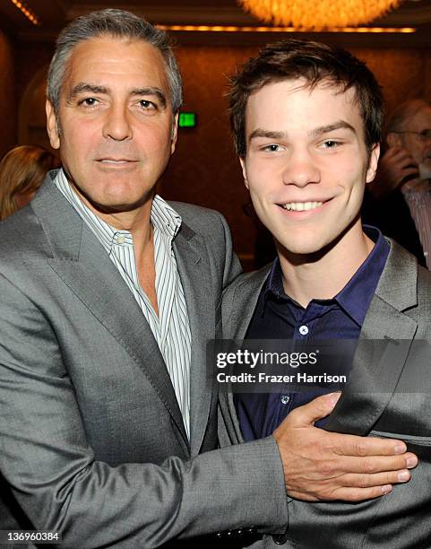 Director/actor George Clooney and actor Nick Krause attend at the 12th Annual AFI Awards held at the Four Seasons Hotel Los Angeles at Beverly Hills...