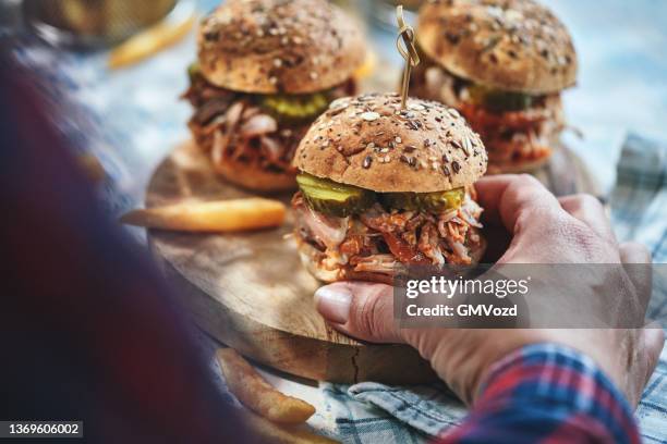 pulled pork sliders with pickles and barbecue sauce - mini burger stock pictures, royalty-free photos & images