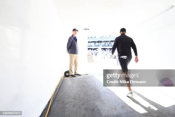 Brooks Koepka of the United States walks through the tunnel to the 16th hole during practice rounds prior to the WM Phoenix Open at TPC Scottsdale on...