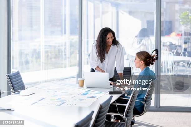 business colleagues having a conversation. - hr manager stock pictures, royalty-free photos & images