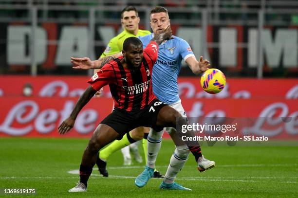 Sergej Milinkovic Savic of SS Lazio competes for the ball with Franck Kessie of AC Milan during the Coppa Italia match between AC Milan ac SS Lazio...