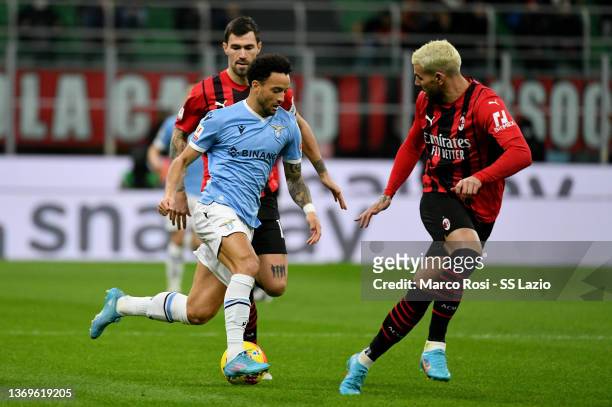 Felipe Anderson of SS Lazio competes for the ball with Theo Hernandez of AC Milan during the Coppa Italia match between AC Milan ac SS Lazio at...
