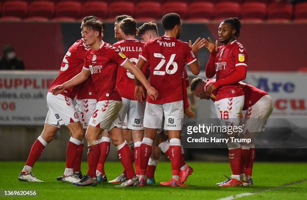 Antoine Semenyo of Bristol City celebrates after scoring their sides first goal with team mates during the Sky Bet Championship match between Bristol...