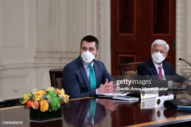 White House National Economic Council Director Brian Deese listens during a meeting with U.S. President Joe Biden in the State Dining Room of the...