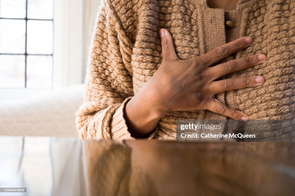Black woman experiences chest pain