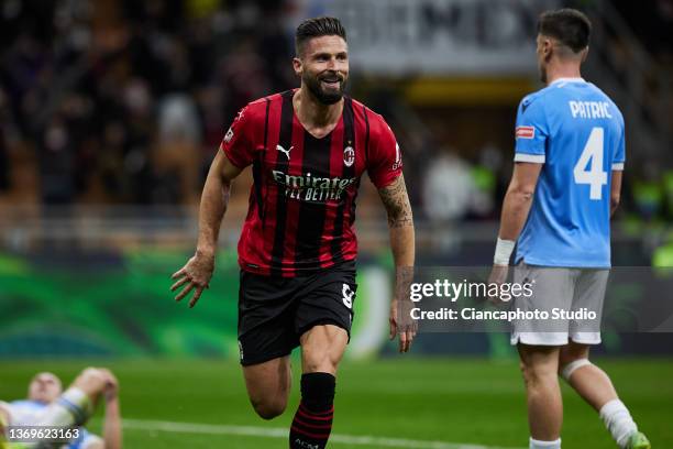 Olivier Giroud of AC Milan celebrates after scoring his team's third goal during the Coppa Italia match between AC Milan ac SS Lazio at Stadio...