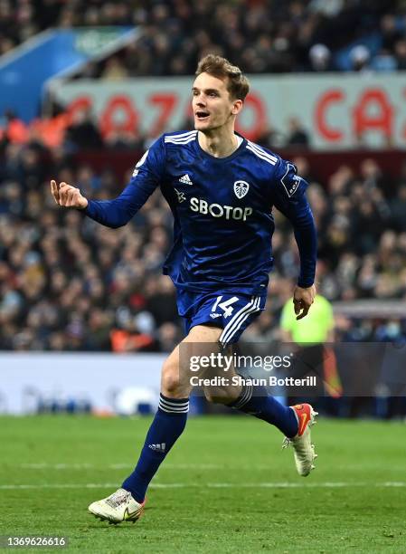 Diego Llorente of Leeds United celebrates after scoring their side's third goal during the Premier League match between Aston Villa and Leeds United...