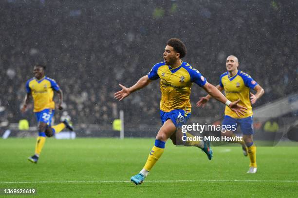 Che Adams of Southampton celebrates after scoring their team's third goal during the Premier League match between Tottenham Hotspur and Southampton...