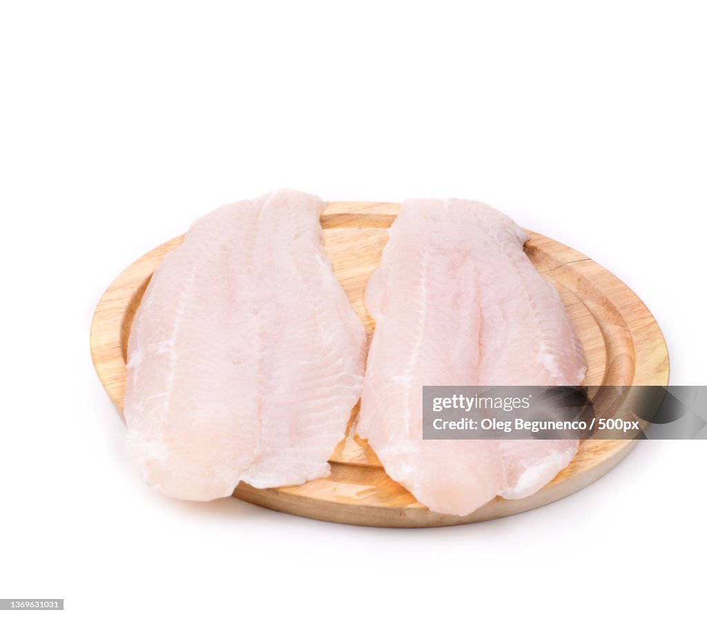 Fresh fillet of pangasius,Close-up of meat on white background,Moldova
