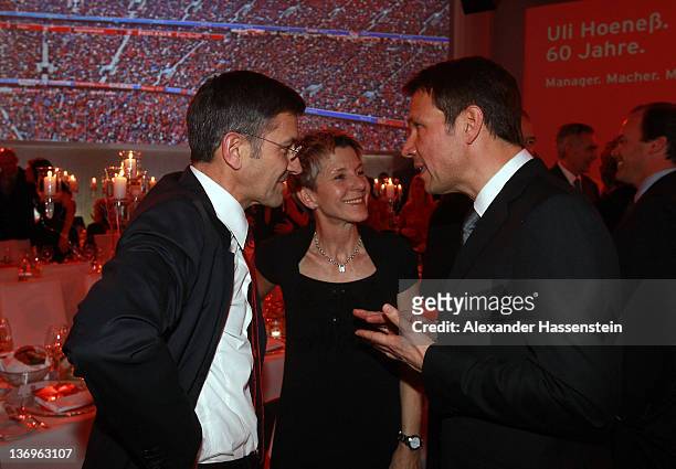 Rene Obermann talks to Herbert Hainer and Angelika Hainer at the Uli Hoeness' 60th birthday celebration at Postpalast on January 13, 2012 in Munich,...