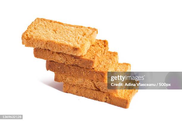 rusk or toasts on a white background - rusk stock pictures, royalty-free photos & images