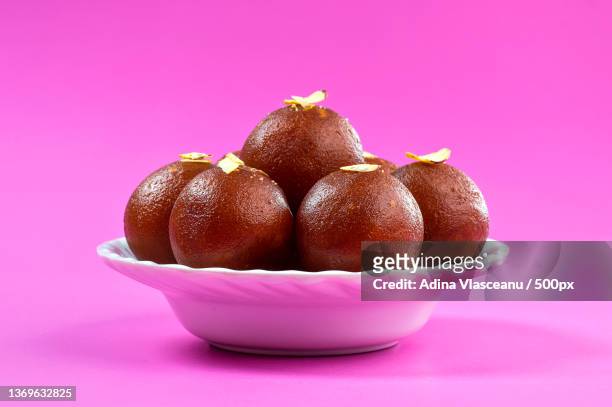 indian dessert gulab jamun in white bowl - gulab jamun stock pictures, royalty-free photos & images