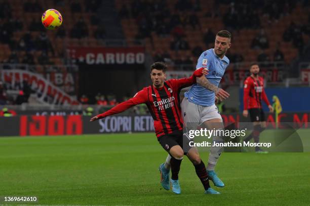 Sergej Milinkovic-Savic of SS Lazio fights for the ball with Brahim Diaz of AC Milan during the Coppa Italia match between AC Milan ac SS Lazio at...