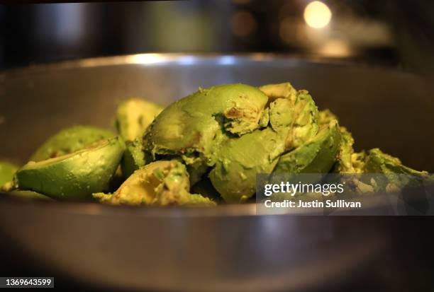 Fresh avocados sit in a bowl while guacamole is prepared at Tommy's Mexican Restaurant on February 09, 2022 in San Francisco, California. A week...