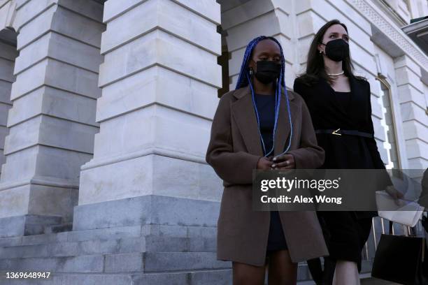 Actress Angelina Jolie leaves with her daughter Zahara Jolie-Pitt after a news conference at the U.S. Capitol February 9, 2022 in Washington, DC....