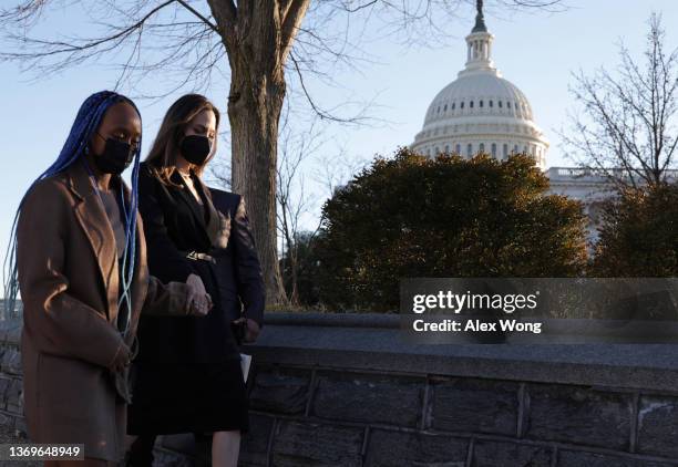 Actress Angelina Jolie leaves with her daughter Zahara Jolie-Pitt after a news conference at the U.S. Capitol February 9, 2022 in Washington, DC....