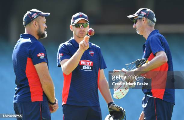 Jason Gillespie coach of the Redbacks chats to his assistant coaches Stephen Stubbings and Luke Butterworth before start of day two of the Sheffield...