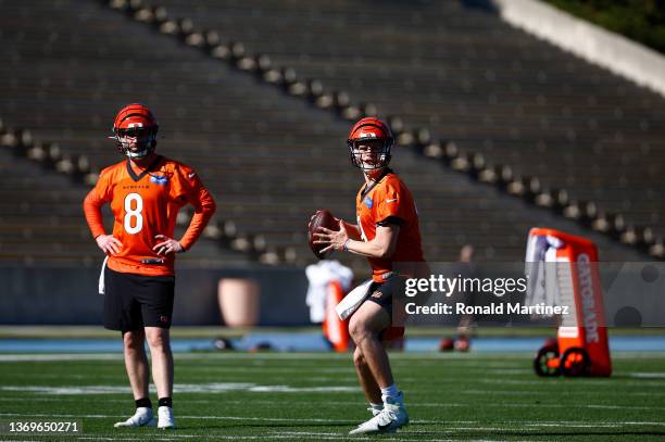 Brandon Allen and Joe Burrow of the Cincinnati Bengals during practice in preparation for Super Bowl LVI at UCLA's Drake Stadium on February 09, 2022...