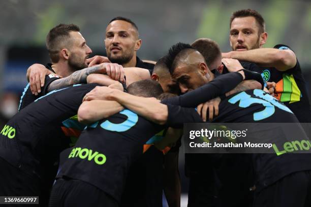 Alexis Sanchez of FC Internazionale is mobbed by team mates after scoring to give the side a 2-0 lead during the Coppa Italia match between FC...