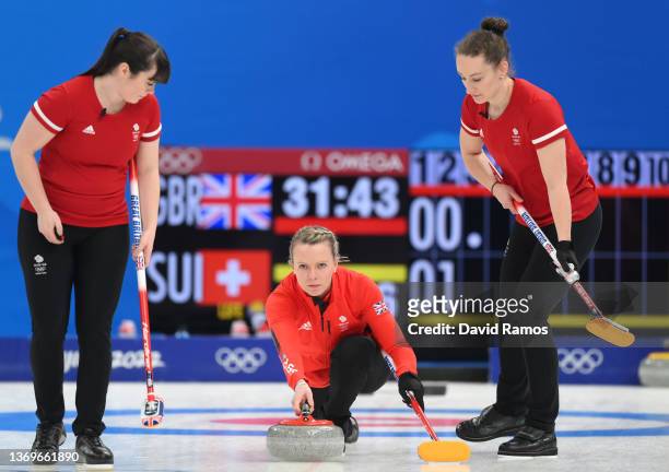 Halley Duff, Vicky Wright and Jennifer Dodds of Team Great Britain compete during the Women's Round Robin Session One against Team Switzerland on Day...