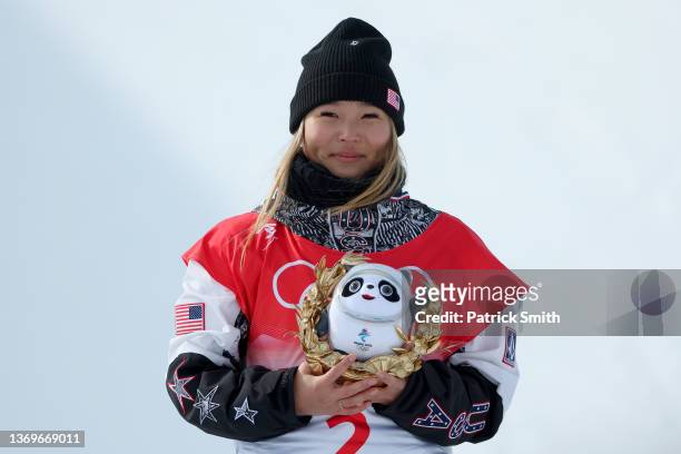 Gold medallist Chloe Kim of Team United States celebrates during the Women's Snowboard Halfpipe Final flower ceremony on Day 6 of the Beijing 2022...