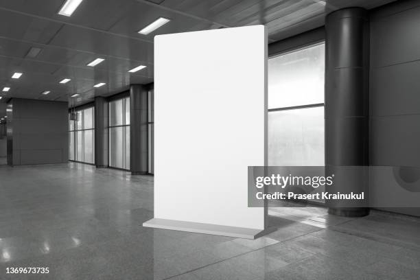 mock up and blank white screen standy billboard in the modern building - commercial sign photos et images de collection