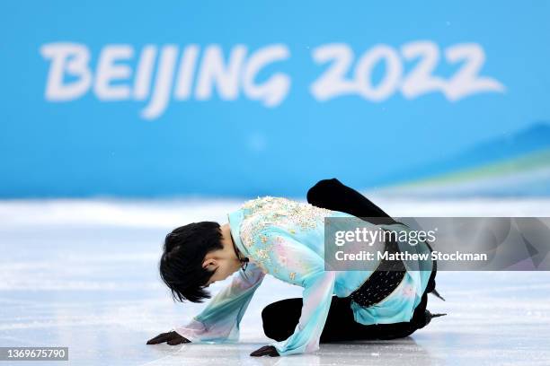 Yuzuru Hanyu of Team Japan falls during the Men Single Skating Free Skating on day six of the Beijing 2022 Winter Olympic Games at Capital Indoor...