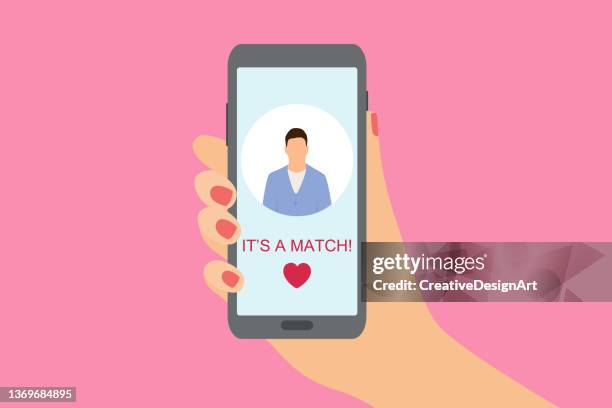 online dating application on mobile phone. female hand holding smartphone and searching friends with couple match application - dating stock illustrations