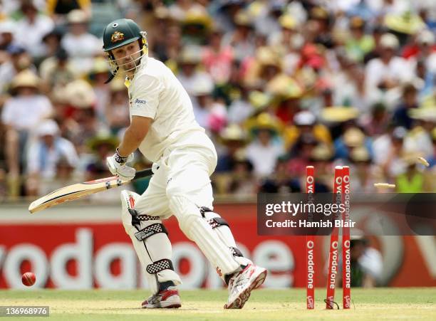 Ed Cowan of Australia is bowled by Umesh Yadav of India during day two of the Third Test match between Australia and India at WACA on January 14,...