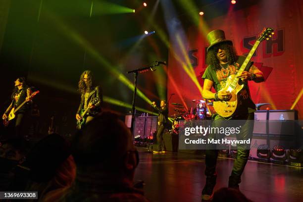 Slash performs onstage with Myles Kennedy and the Conspirators during the River Is Rising tour at the Paramount Theatre on February 09, 2022 in...