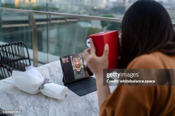 long distance couple enjoying conversation using technology. - zoom date stock pictures, royalty-free photos & images