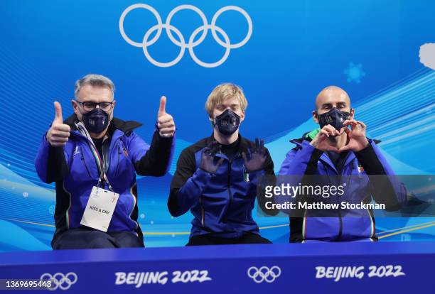 Daniel Grassl of Team Italy reacts to their score during the Men Single Skating Free Skating on day six of the Beijing 2022 Winter Olympic Games at...