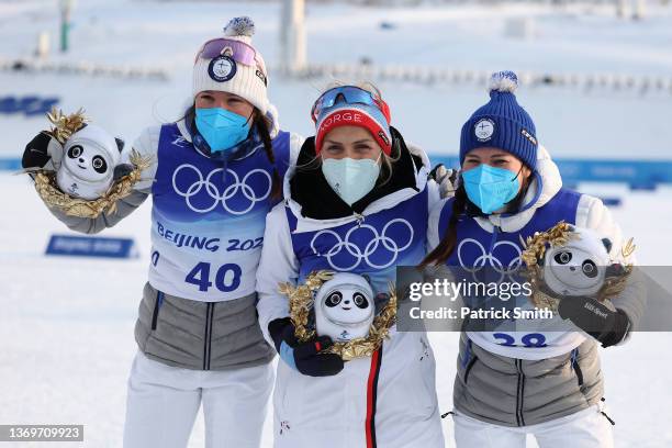 Gold medallist Therese Johaug of Team Norway , Silver medallist Kerttu Niskanen of Team Finland and Bronze medallist Krista Parmakoski of Team...