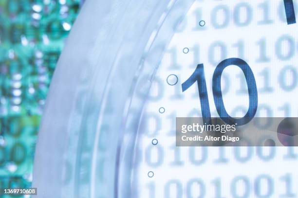 binary code and an electronic circuit board. concept of robotics and artificial intelligence. - generation x foto e immagini stock
