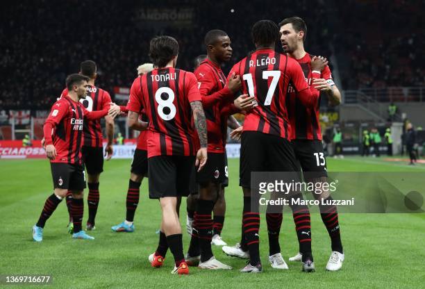 Rafael Leao of AC Milan celebrates with his team-mates after scoring the opening goal during the Coppa Italia match between AC Milan ac SS Lazio at...