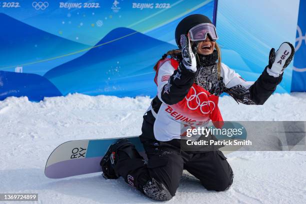 Chloe Kim of Team United States celebrates after her first run during the Women's Snowboard Halfpipe Final on Day 6 of the Beijing 2022 Winter...