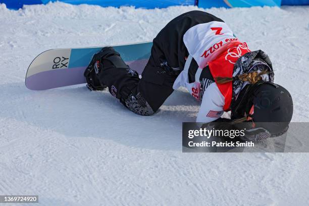 Chloe Kim of Team United States celebrates after her first run during the Women's Snowboard Halfpipe Final on Day 6 of the Beijing 2022 Winter...