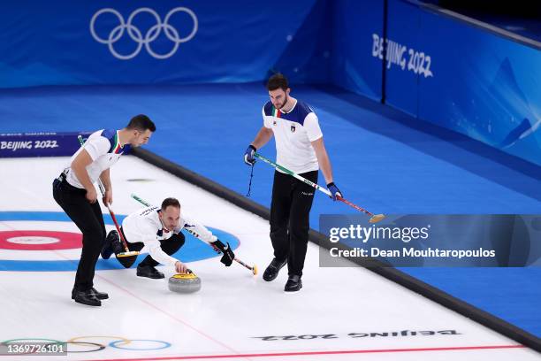 Sebastiano Arman, Joel Retornaz and Amos Mosaner of Team Italy compete against Team Great Britain during the Men's Round Robin Session on Day 6 of...