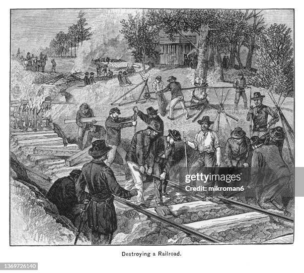 old engraved illustration of union general william tecumseh sherman's march trough georgia (1864), destroying the confederate infrastructure - the bridges and railroads - confederate states army - fotografias e filmes do acervo