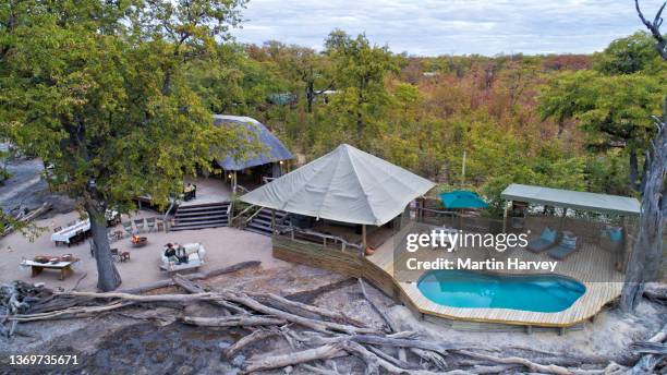 aerial view of hyena pan safari lodge in botswana - safari lodge stock pictures, royalty-free photos & images