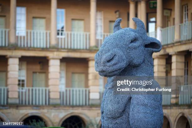 Minotaur' by British sculptor Sophie Ryder is displayed in the courtyard of the historic Piece Hall on February 10, 2022 in Halifax, England. "Dances...