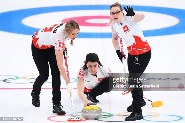 Melanie Barbezat, Esther Neuenschwander and Alina Paetz of Team Switzerland compete against Team China during the Women's Round Robin Session Two on...