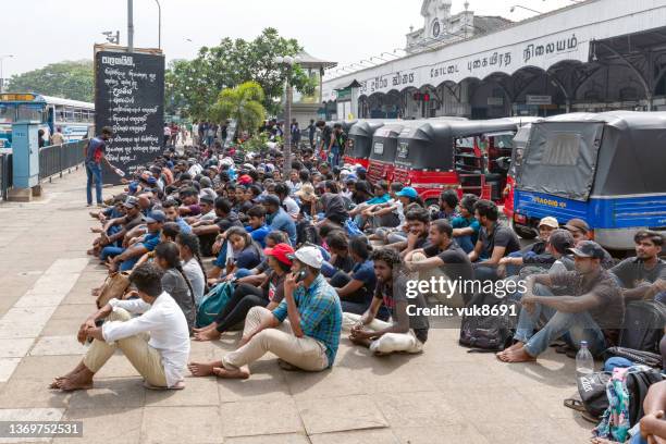 students protest at colombo railway station - sri lankan ethnicity stock pictures, royalty-free photos & images